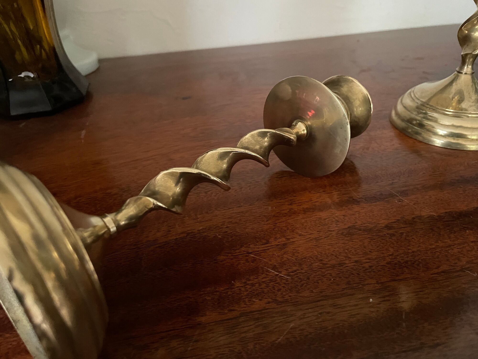 Pair of twisted brass candle holders