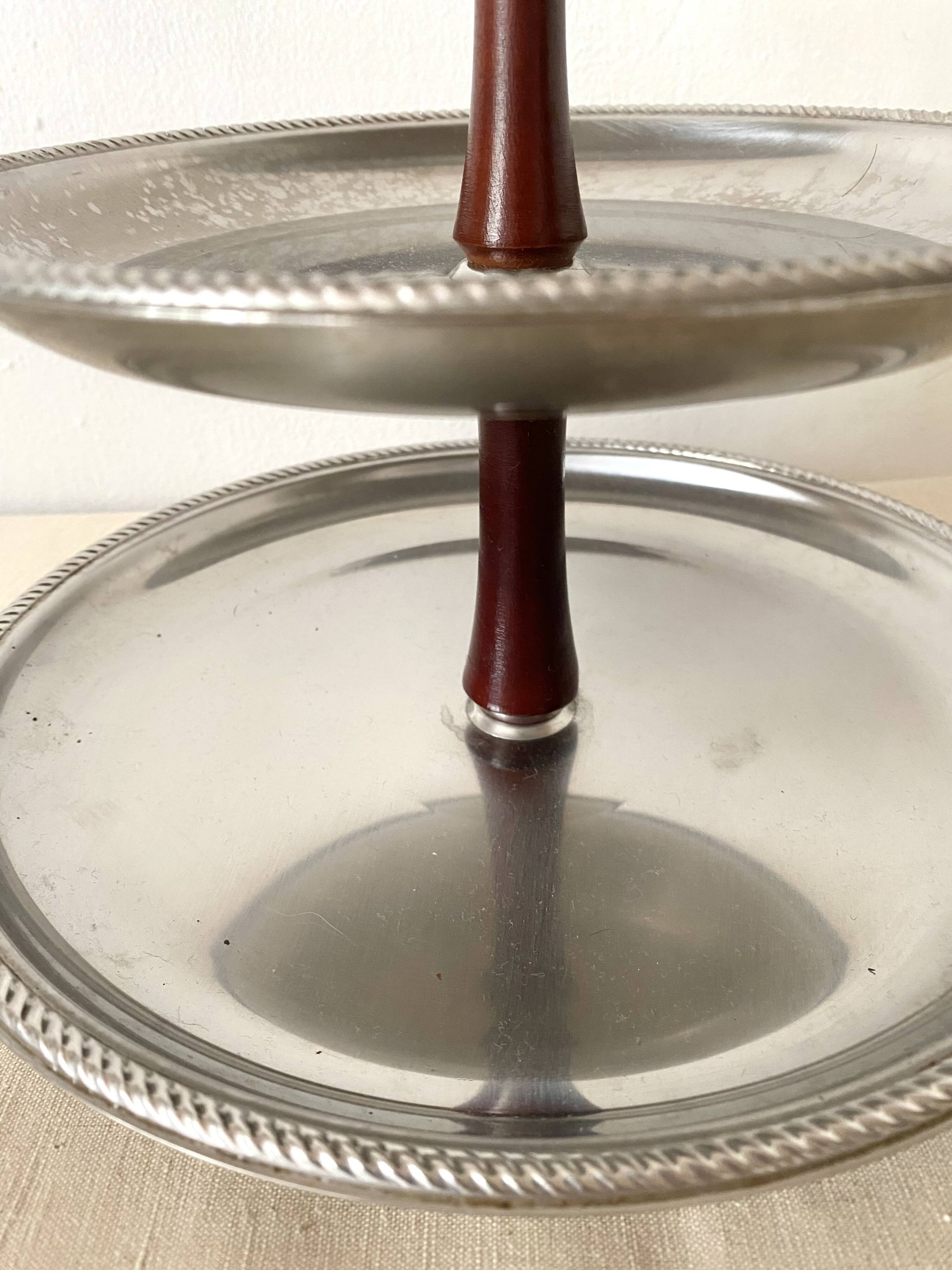 Vintage tiered display stand, stainless steel rotating server Alessi Fratelli