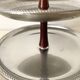 Vintage tiered display stand, stainless steel rotating server Alessi Fratelli