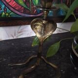 Old cobra bronze candlestick