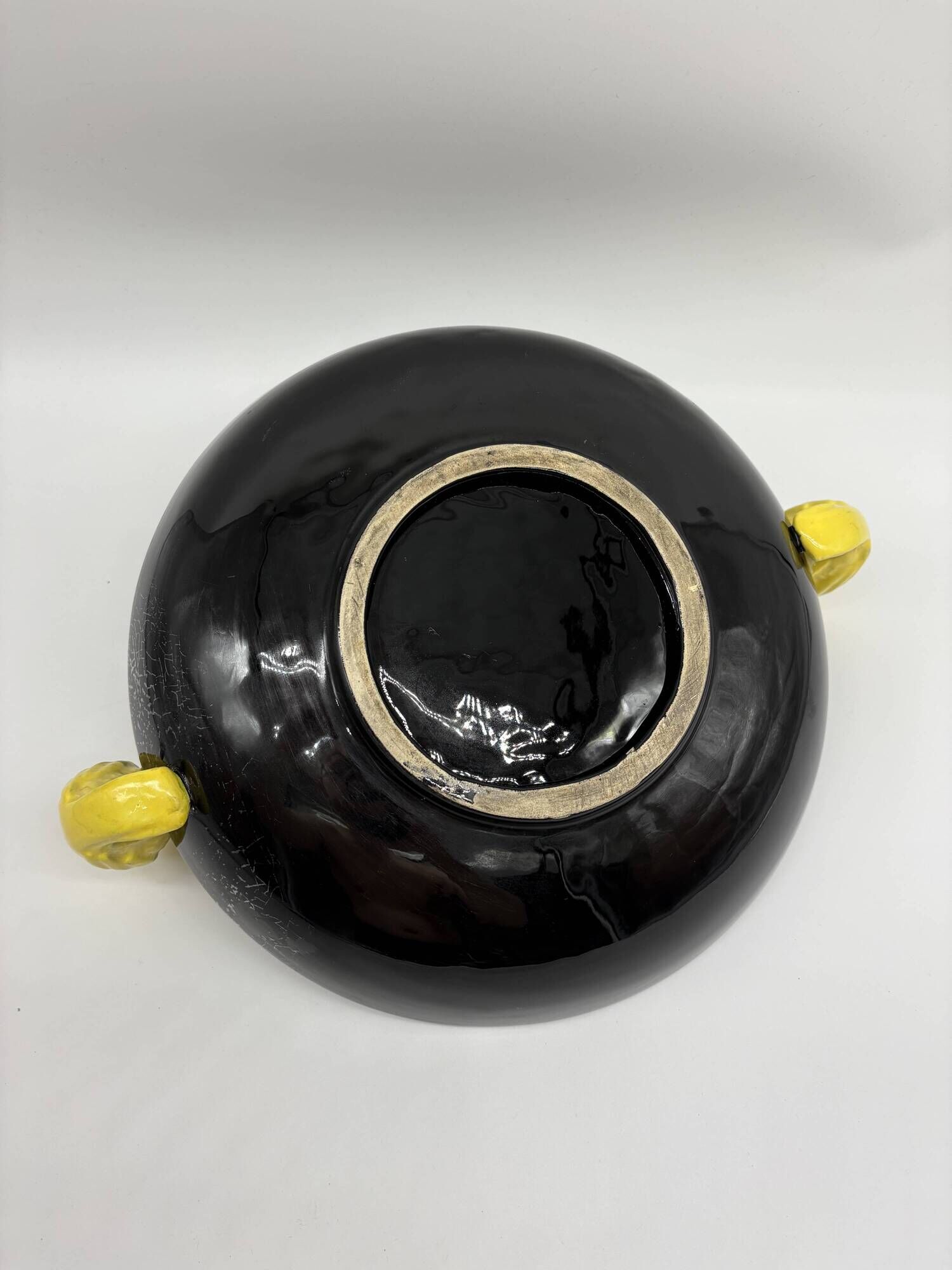 Large vintage black ceramic bowl with yellow parakeets, Vallauris.