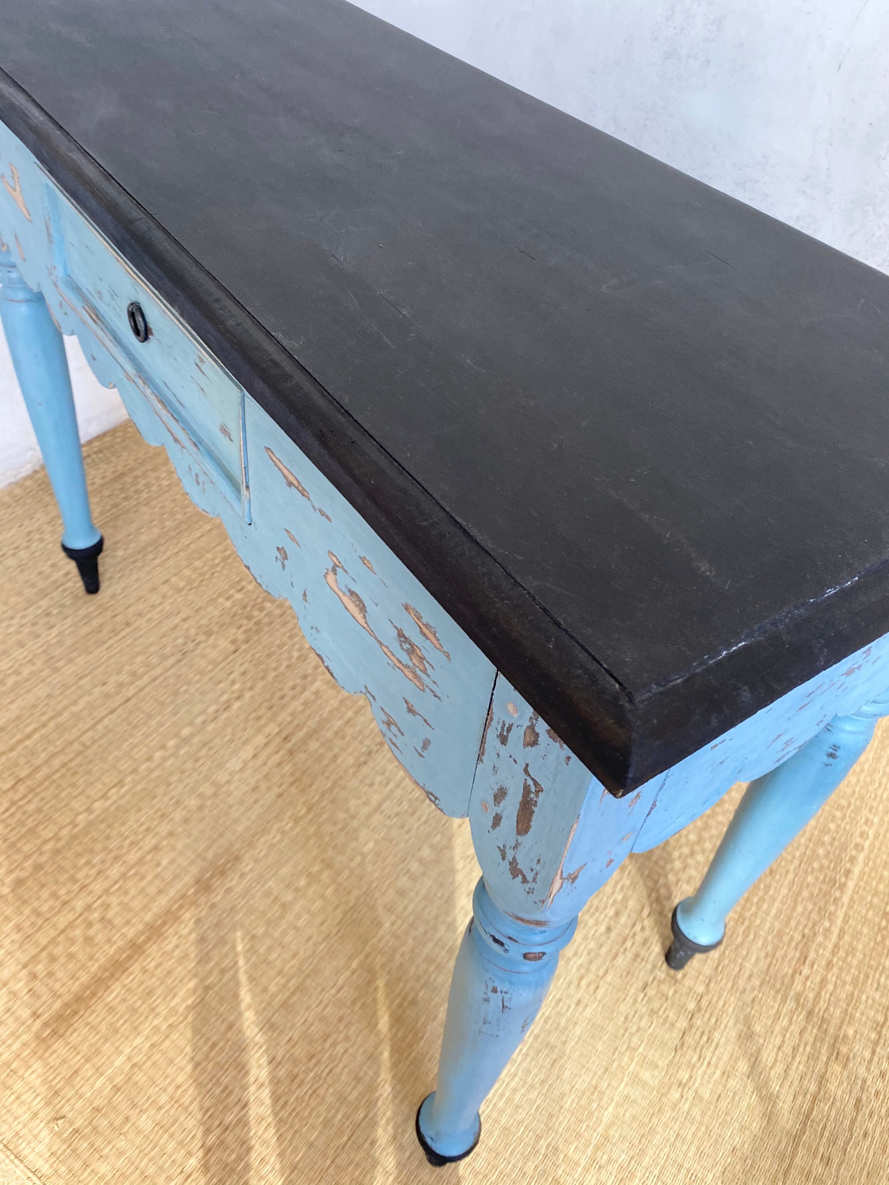 Scalloped console table