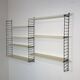 Vintage Nisse Strinning wall rack with 7 off-white shelves