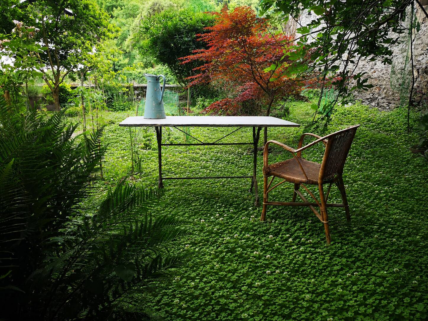 Old bistro table – cast iron legs and natural slate top