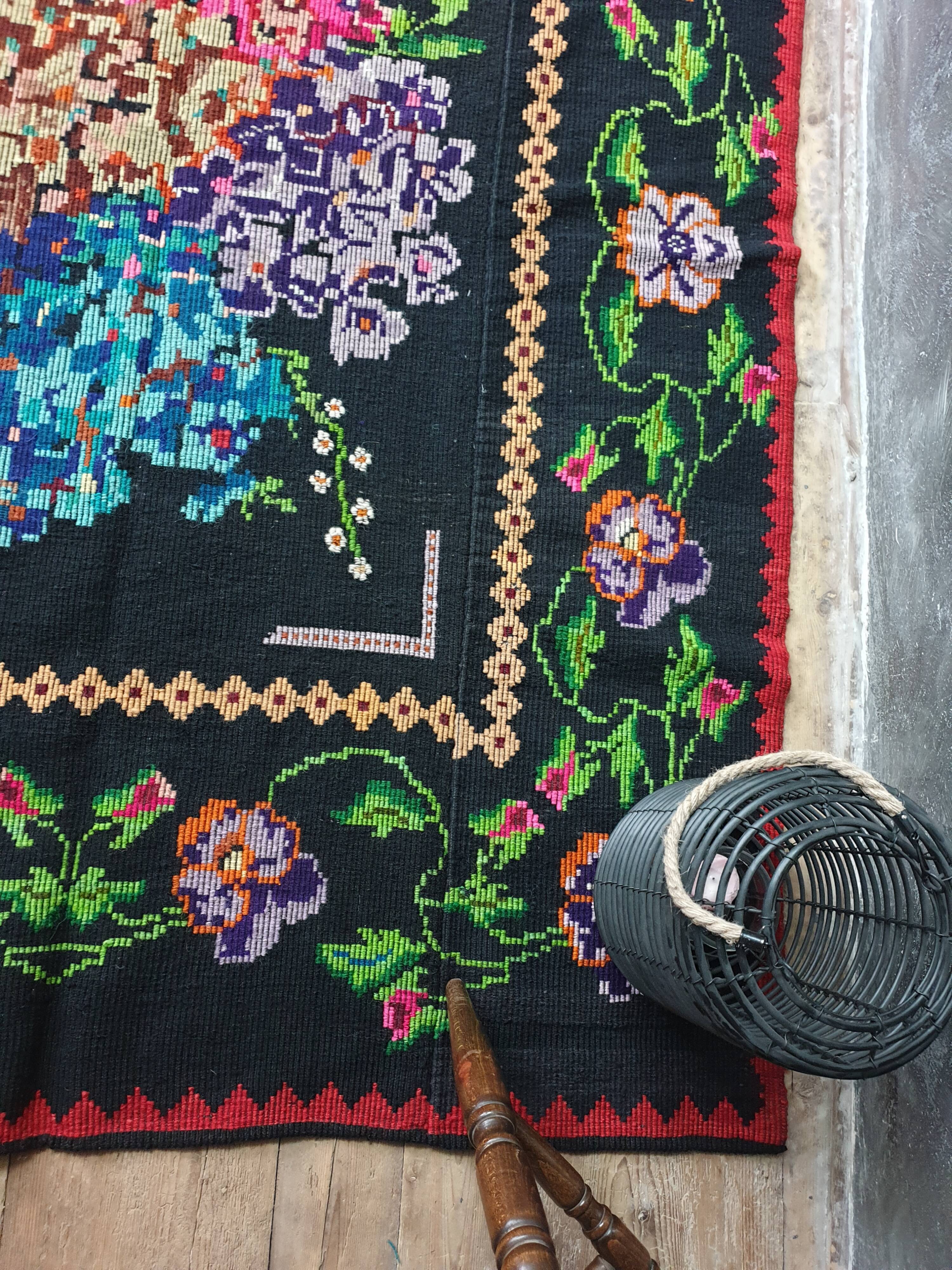 Vintage wool rug with floral design in sweet colors