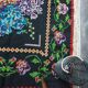 Tapis en laine vintage avec un design floral dans des couleurs douces