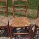 17 old straw chairs
