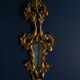 Italian mirror in gilded wood with gold leaf from the 18th century.