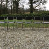 6 vintage chairs in black skaï with chrome metal tubular base.