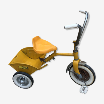 Yellow tricycle with folding bucket