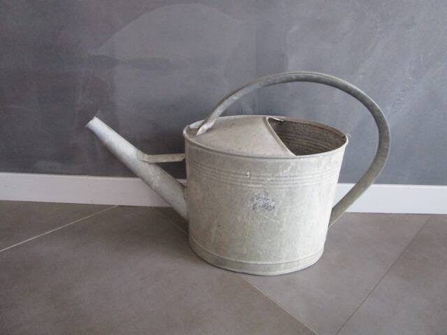 Old zinc watering can