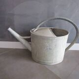 Old zinc watering can