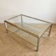 Vintage 1970s coffee table in brass and chrome in the style of Willy Rizzo.