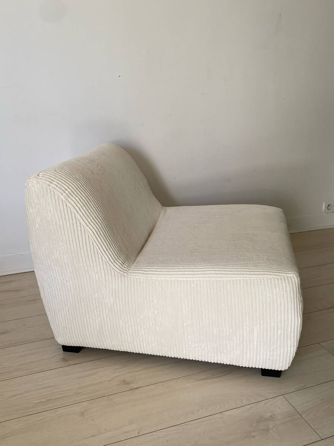 White corduroy armchair