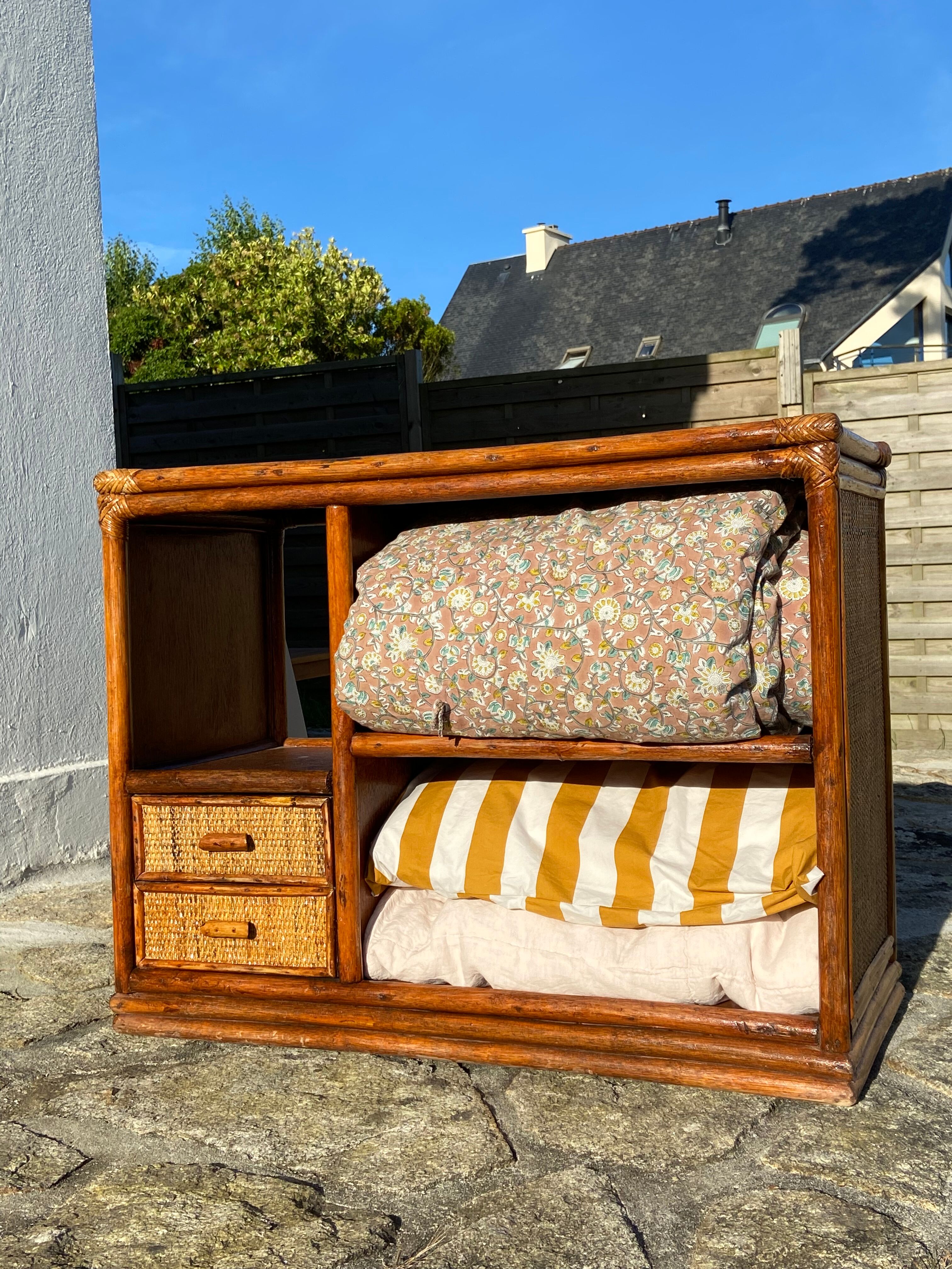Wooden chest of drawers and rattan