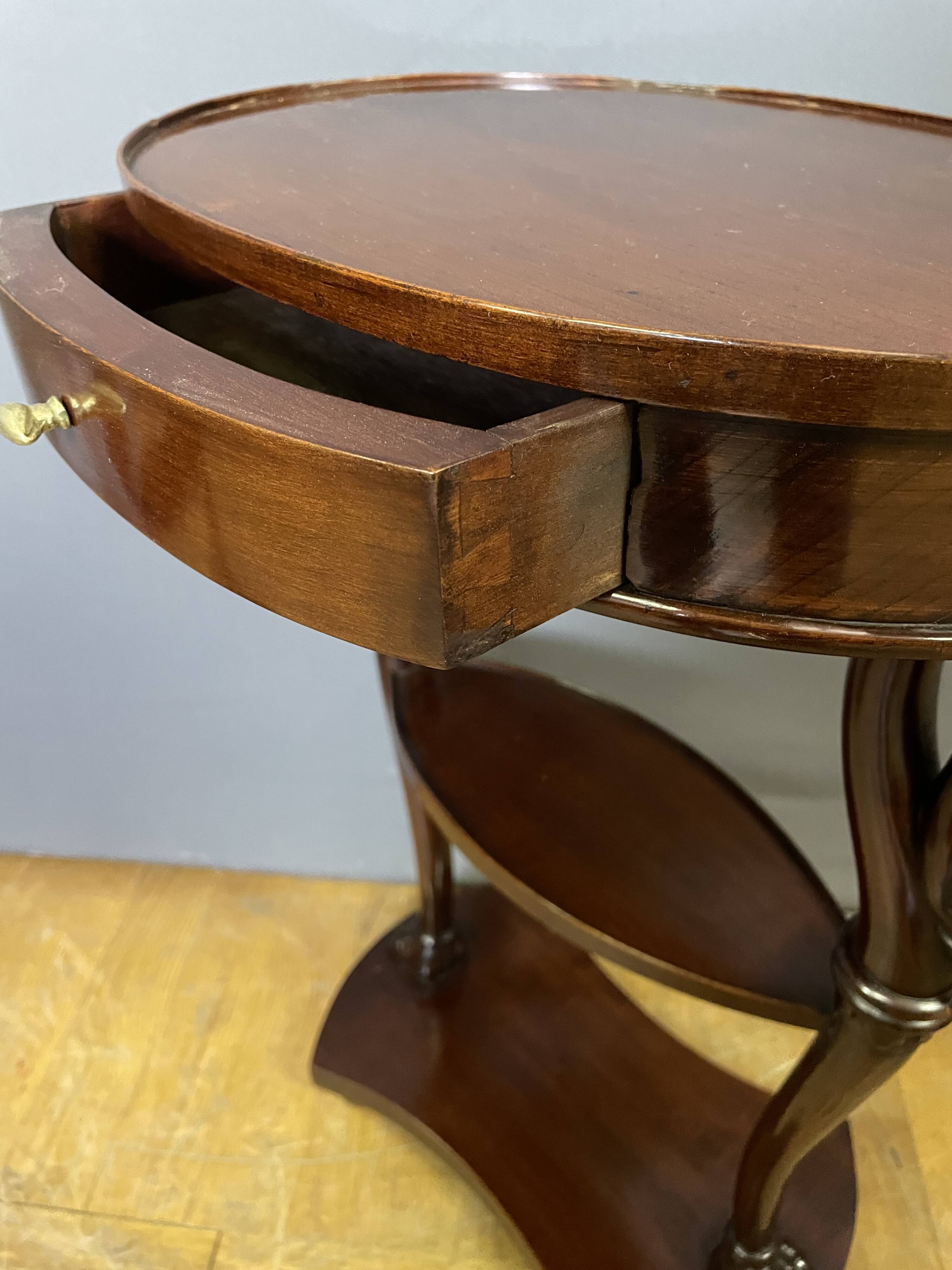 Mahogany bedside table with swan neck.