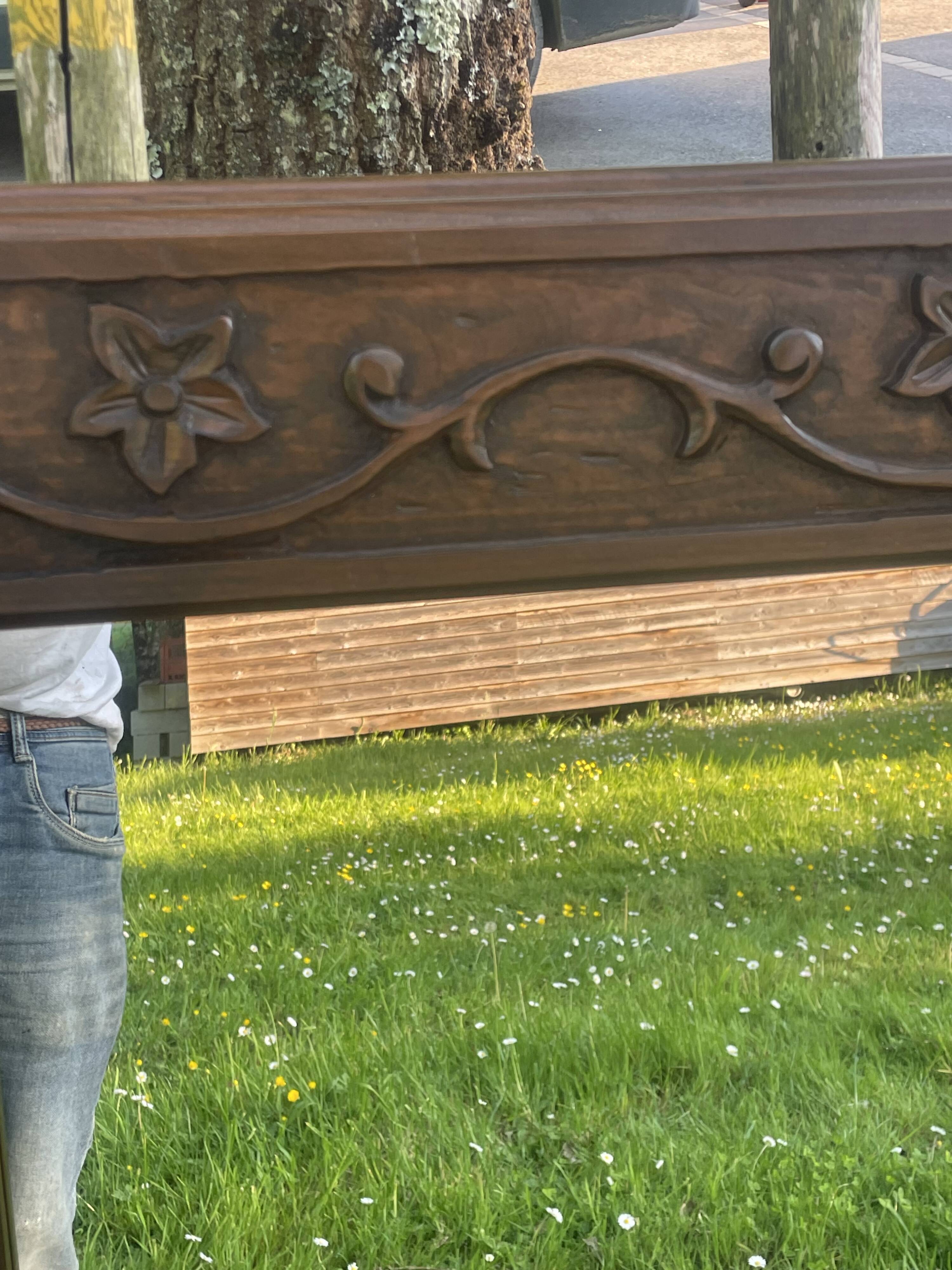 Large carved wooden mirror in Art Nouveau style