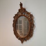 Italian mirror in gilded scupted wood
