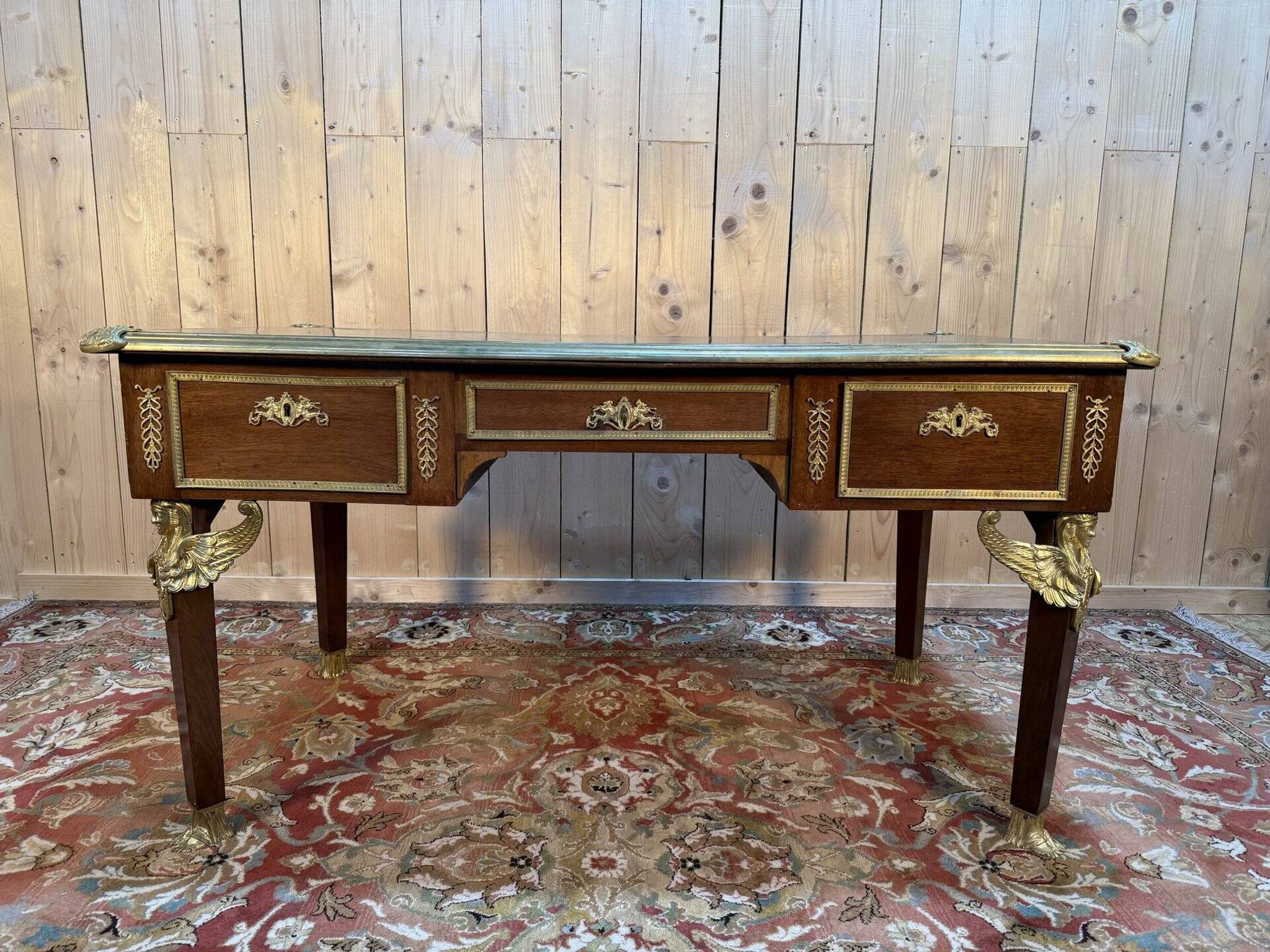 Bureau double plat de style empire en acajou et cuir vert