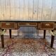 Bureau double plat de style empire en acajou et cuir vert