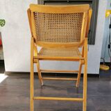 Vintage wooden folding chair with 1970 rattan seat and back