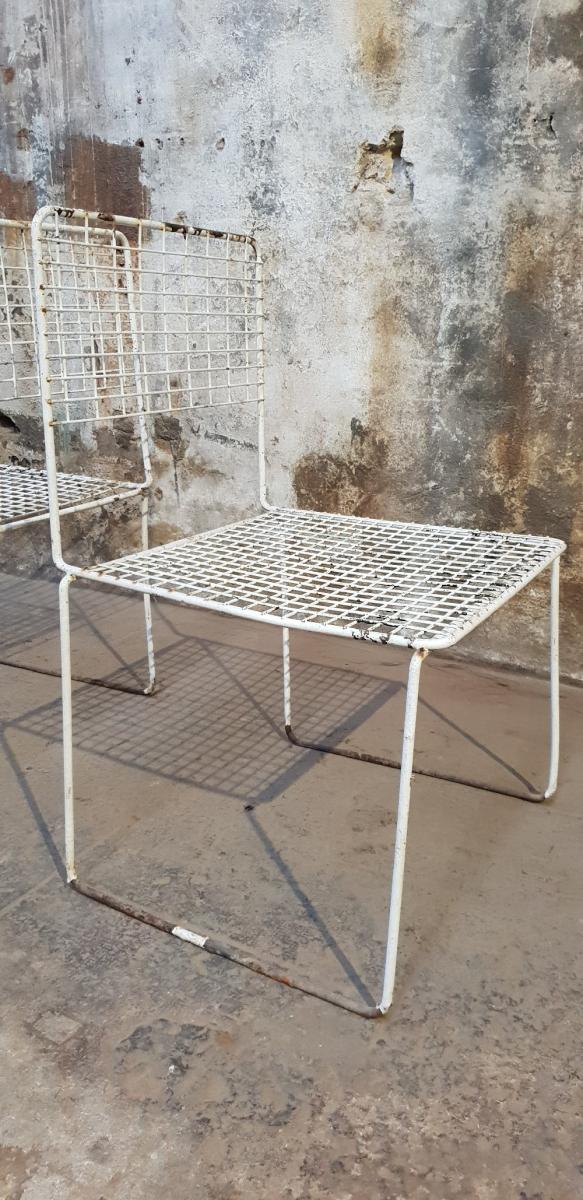 Two vintage metal chairs
