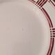 Eight Badonviller dinner plates