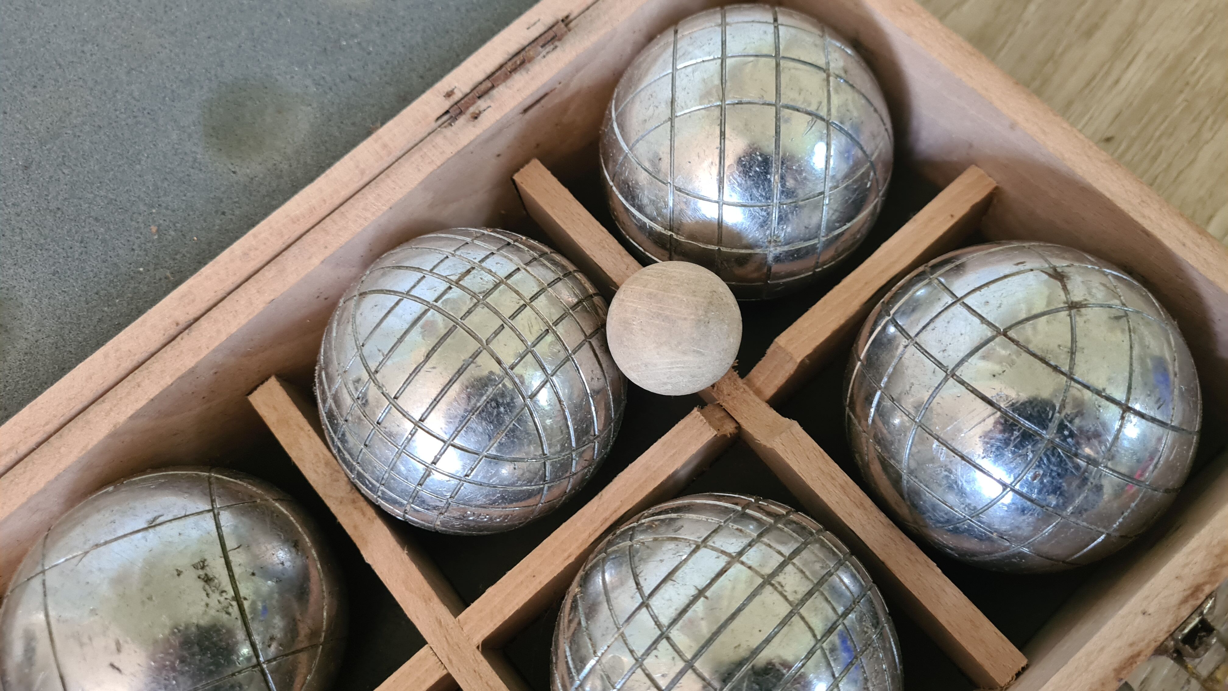 Old obut balls with original wooden box