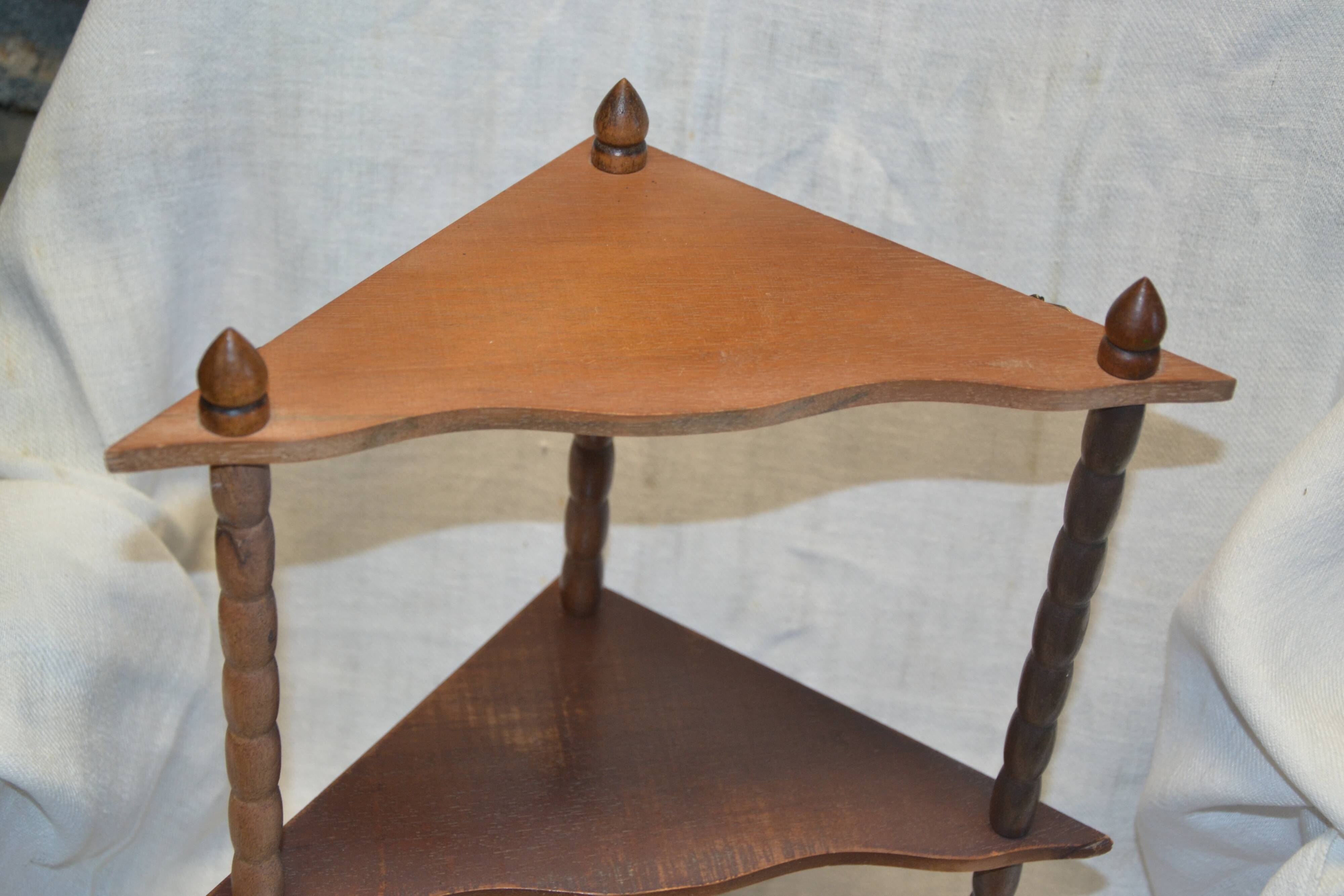 small wooden corner shelf