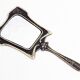 Art Deco hand mirror in bronze 8x17cm