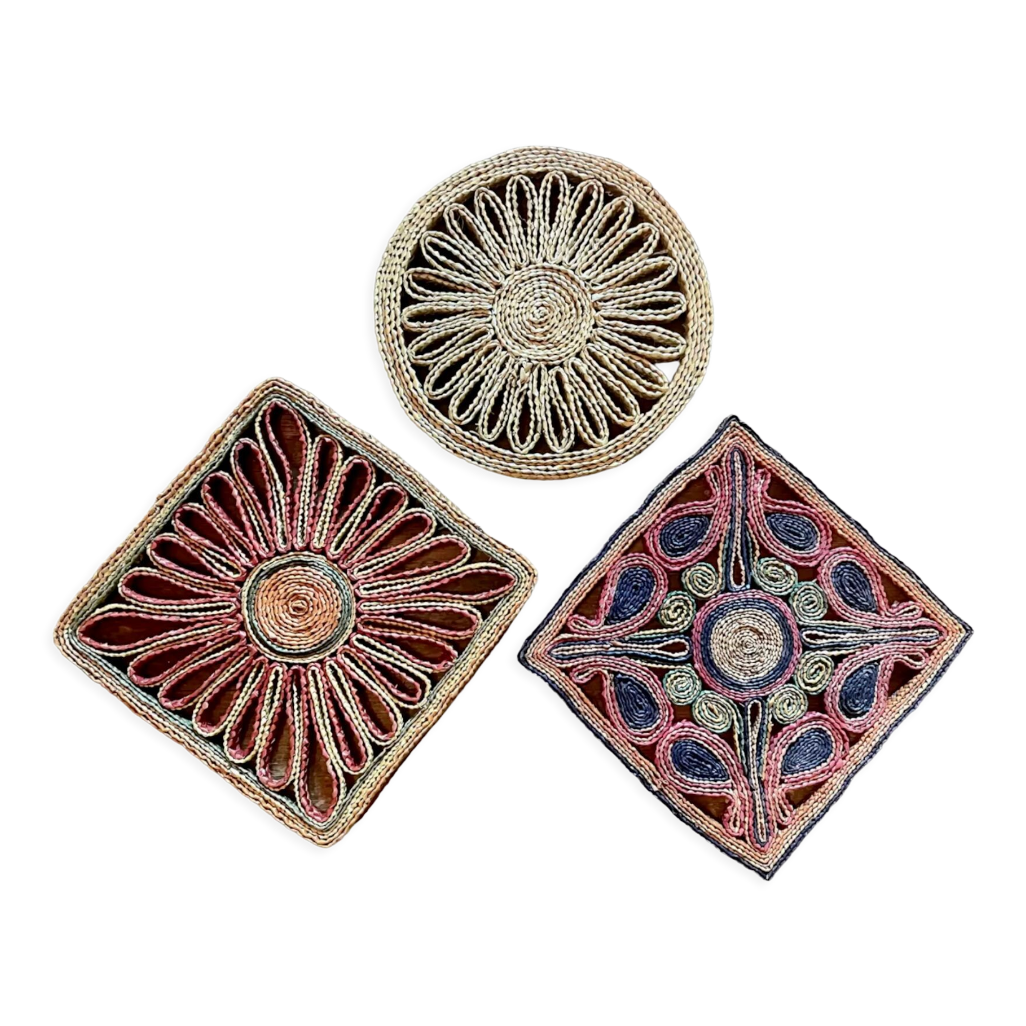 3 woven straw trivets