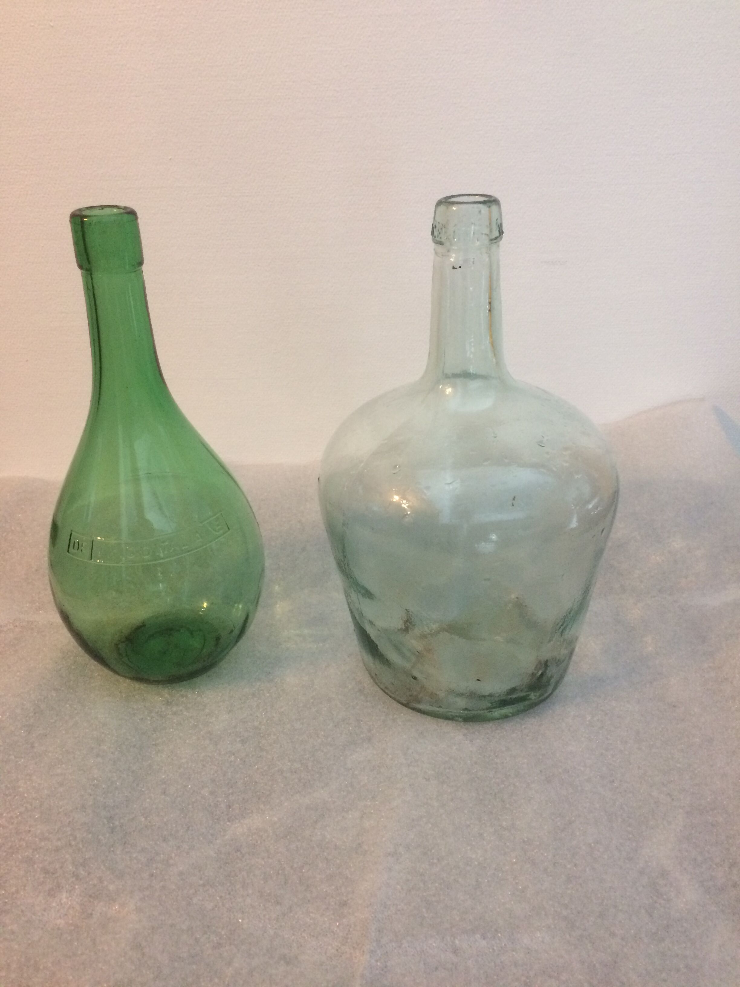 Pair of 1 liter and 2 liters demijohns