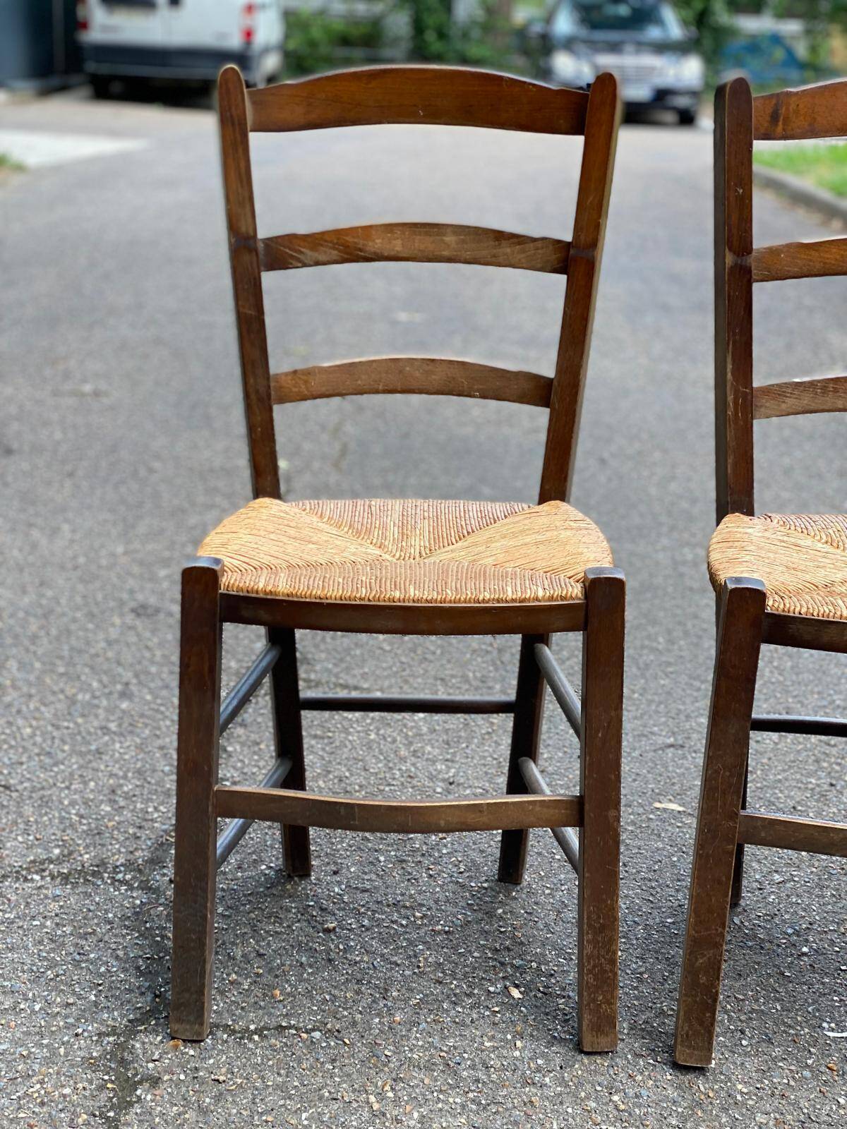 3 solid wood and straw chairs