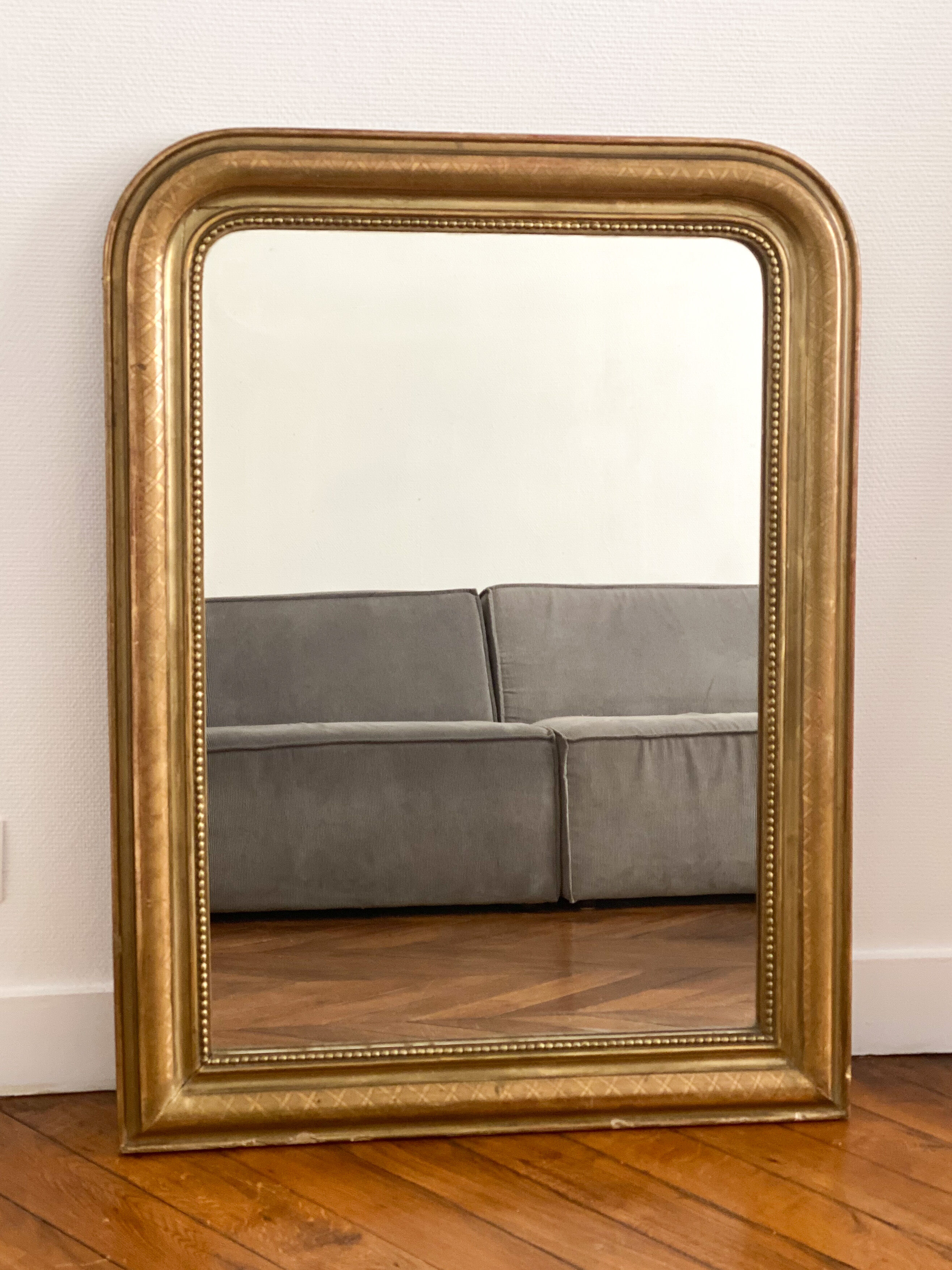 Miroir Louis Philippe perlé doré sculpté 74x98cm