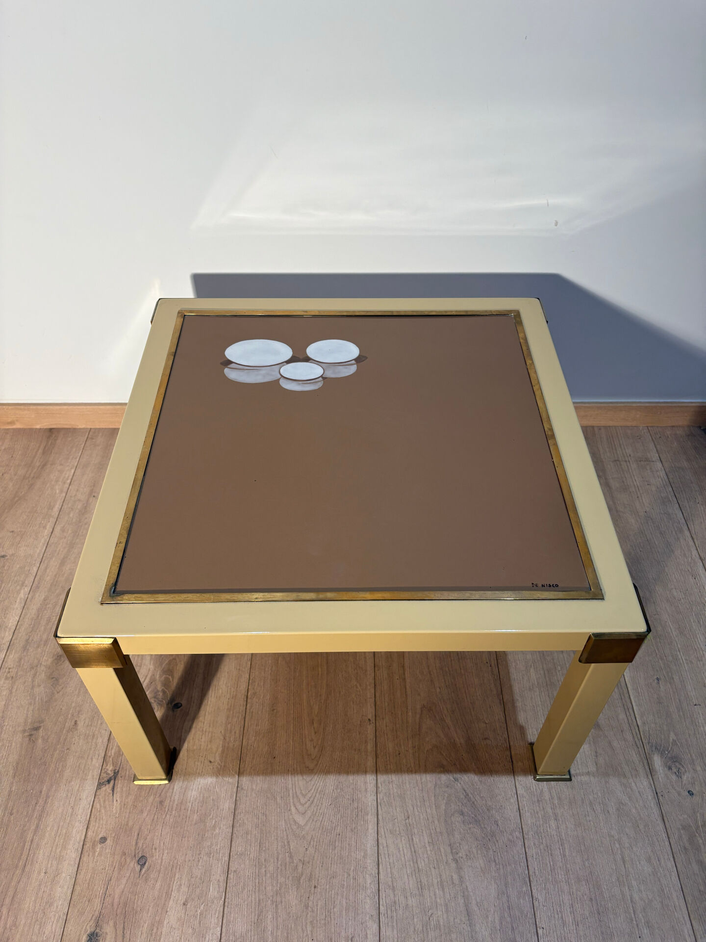 Metal and brass coffee table in ceramic by Nisco.