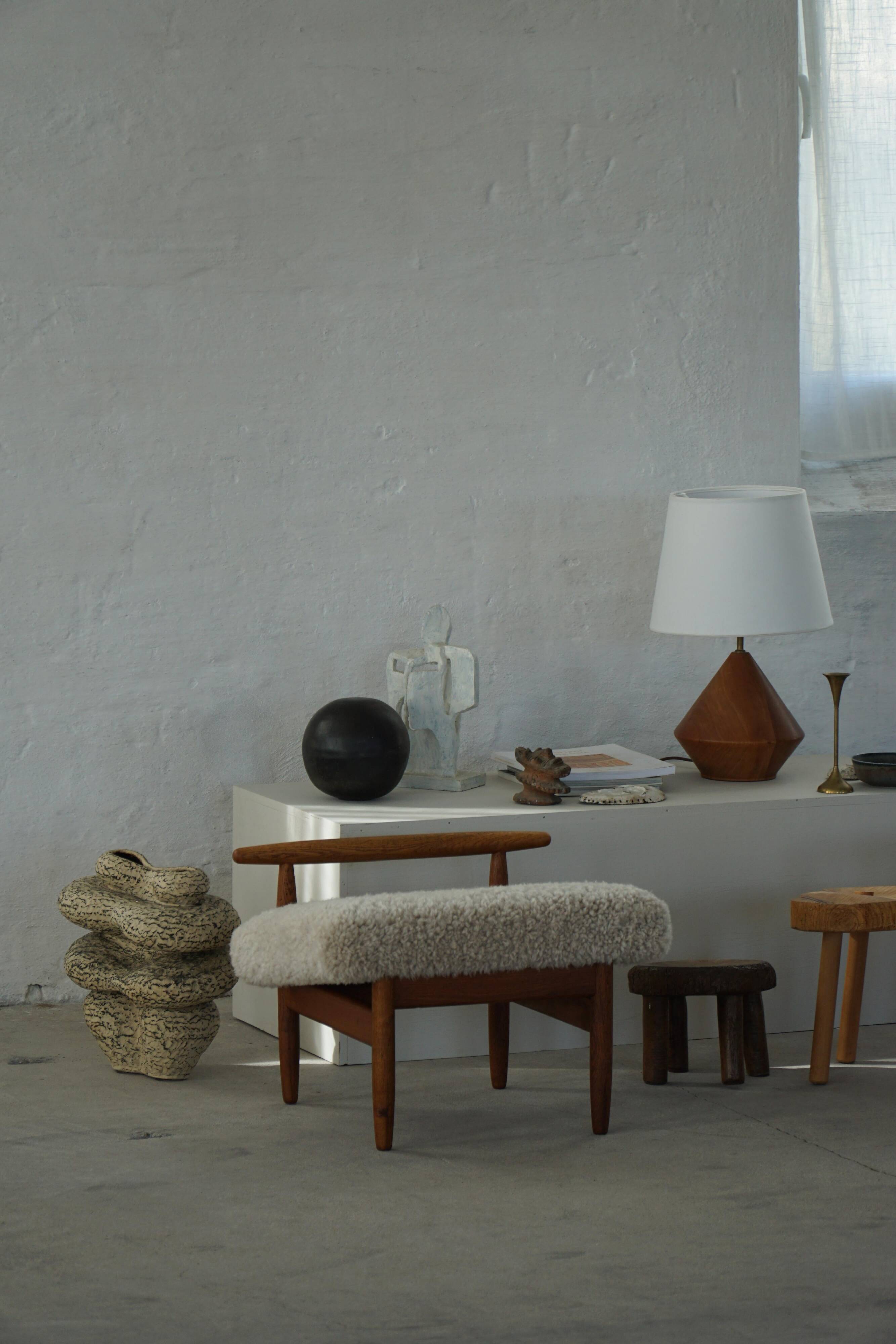 Eivind A. Johansen, oak footrest with light lambswool padding for FDB Møbler