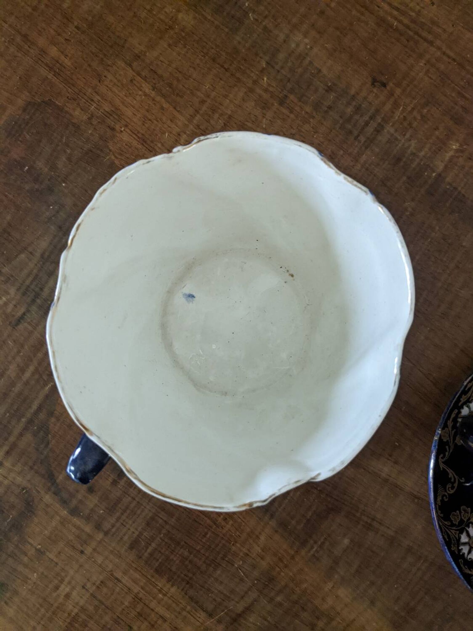 Set of two large Lunéville cups and saucers