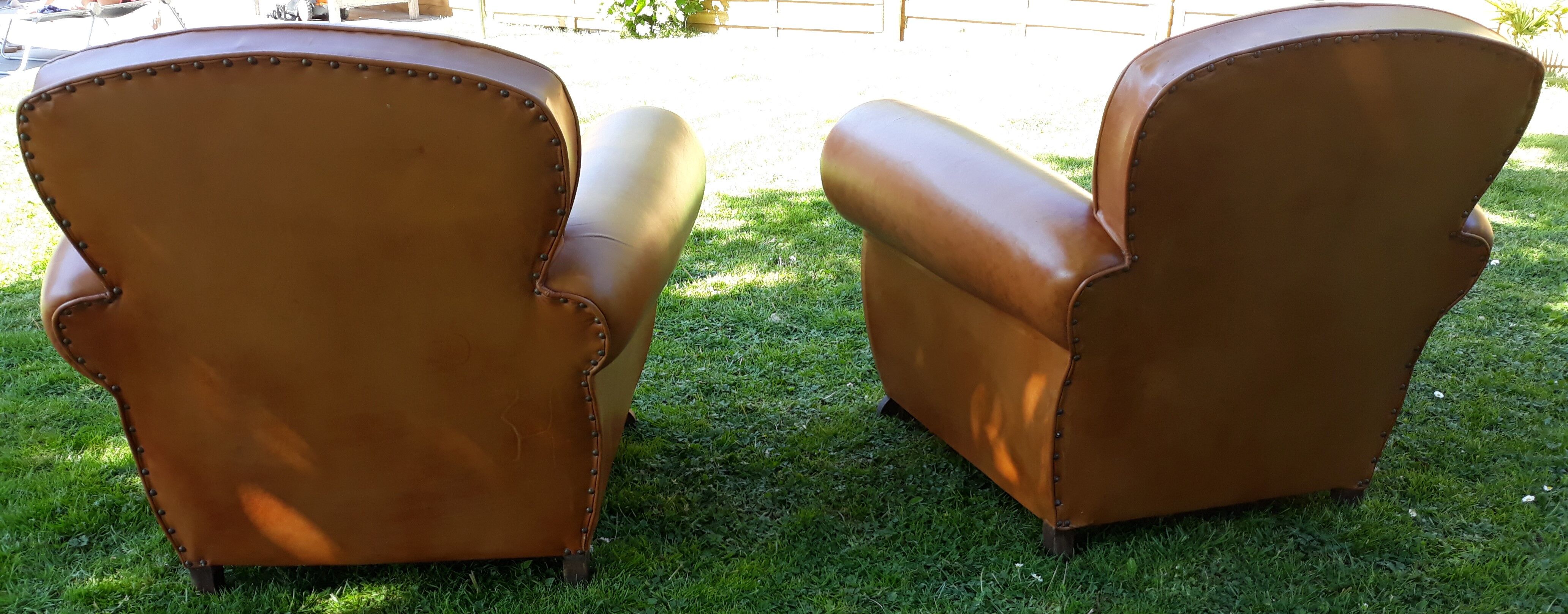 Paire de fauteuils club 1950