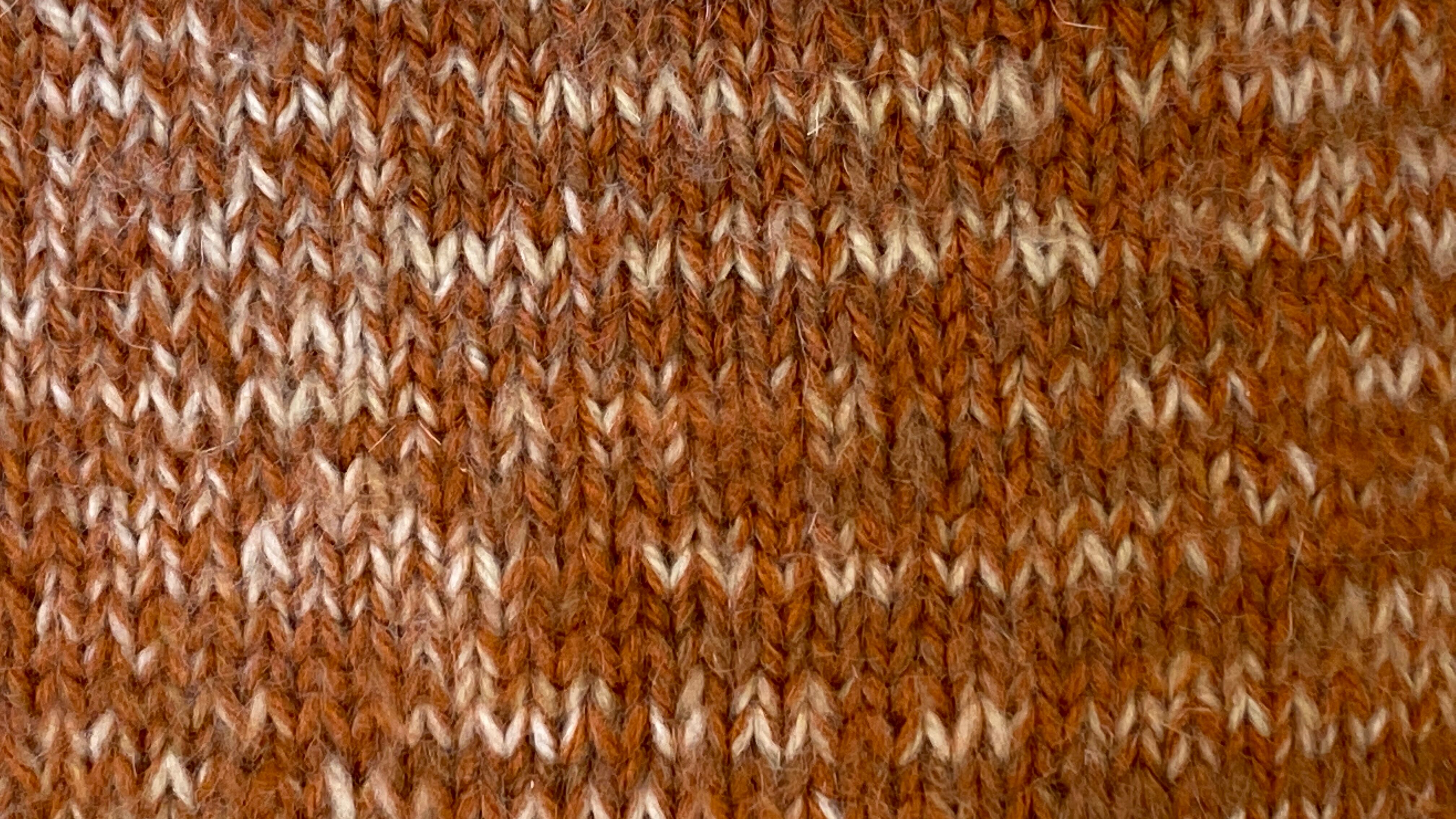 Pair of retro terracotta wool knit cushions