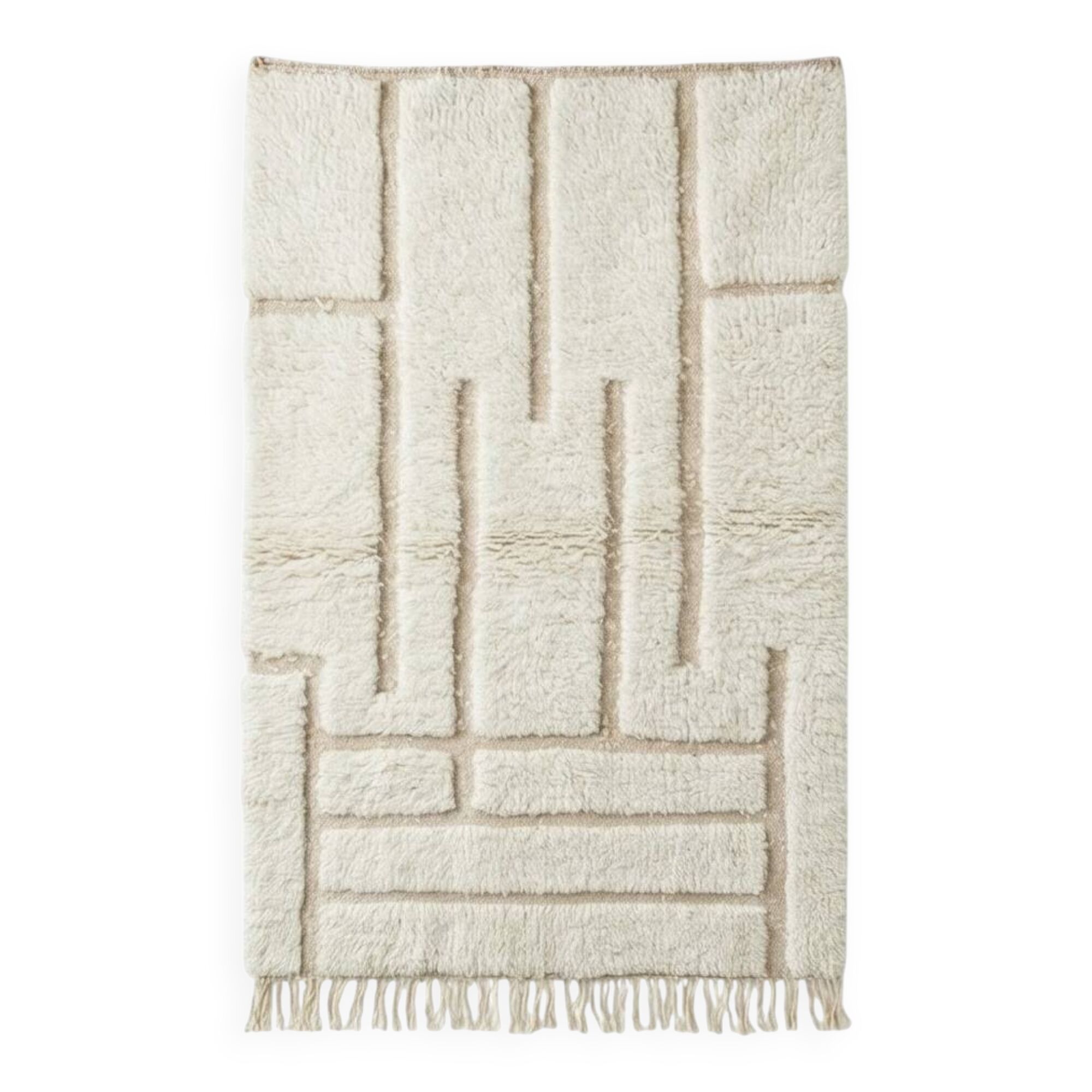 White Moroccan rug with a graphic pattern.