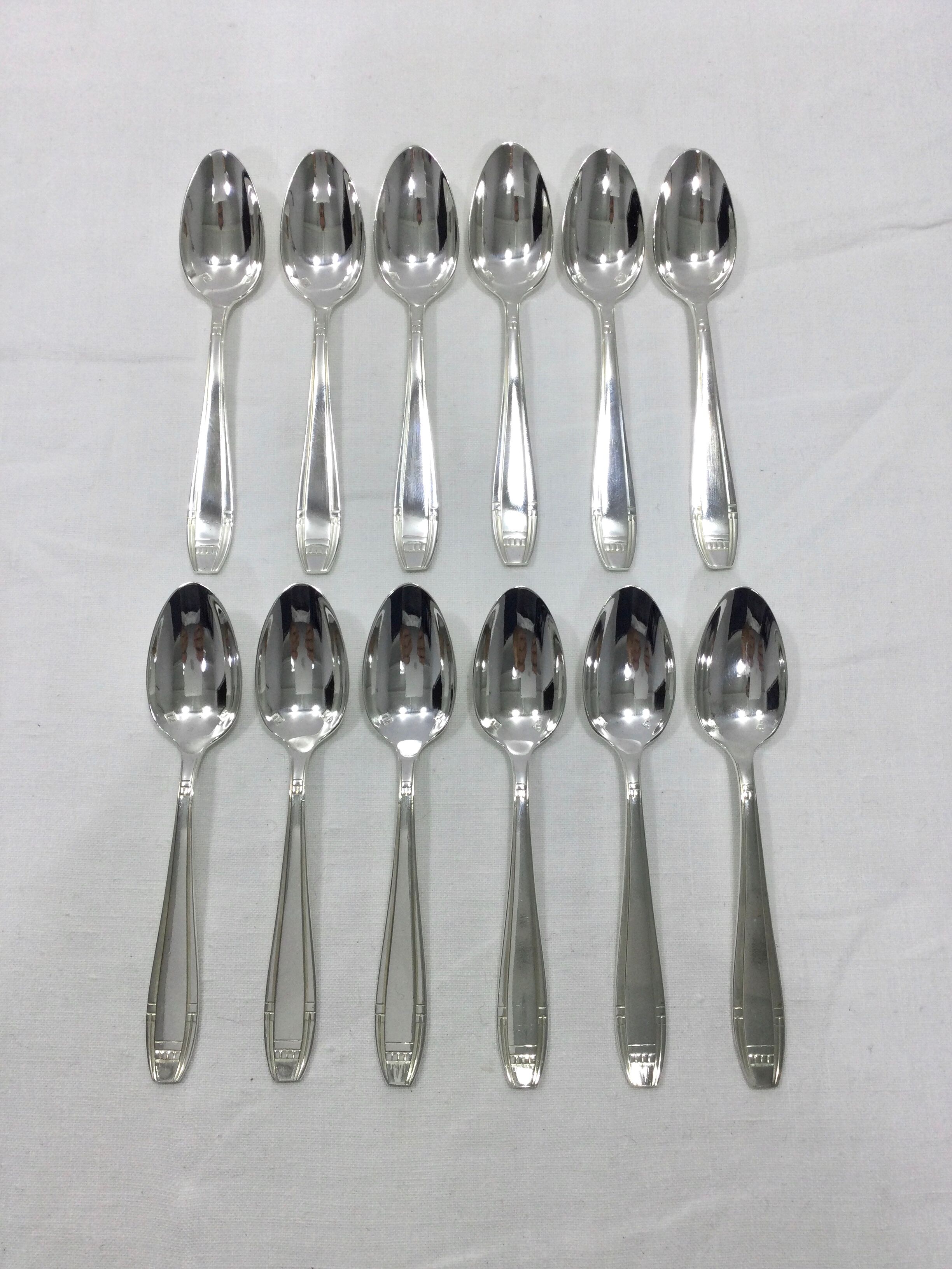 12 art deco mocha spoons made of silver metal