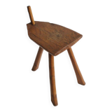 Brutalist tripod stool in carved wood, 1950s