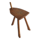 Brutalist tripod stool in carved wood, 1950s