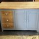 Vintage sideboard painted in gray and raw wood