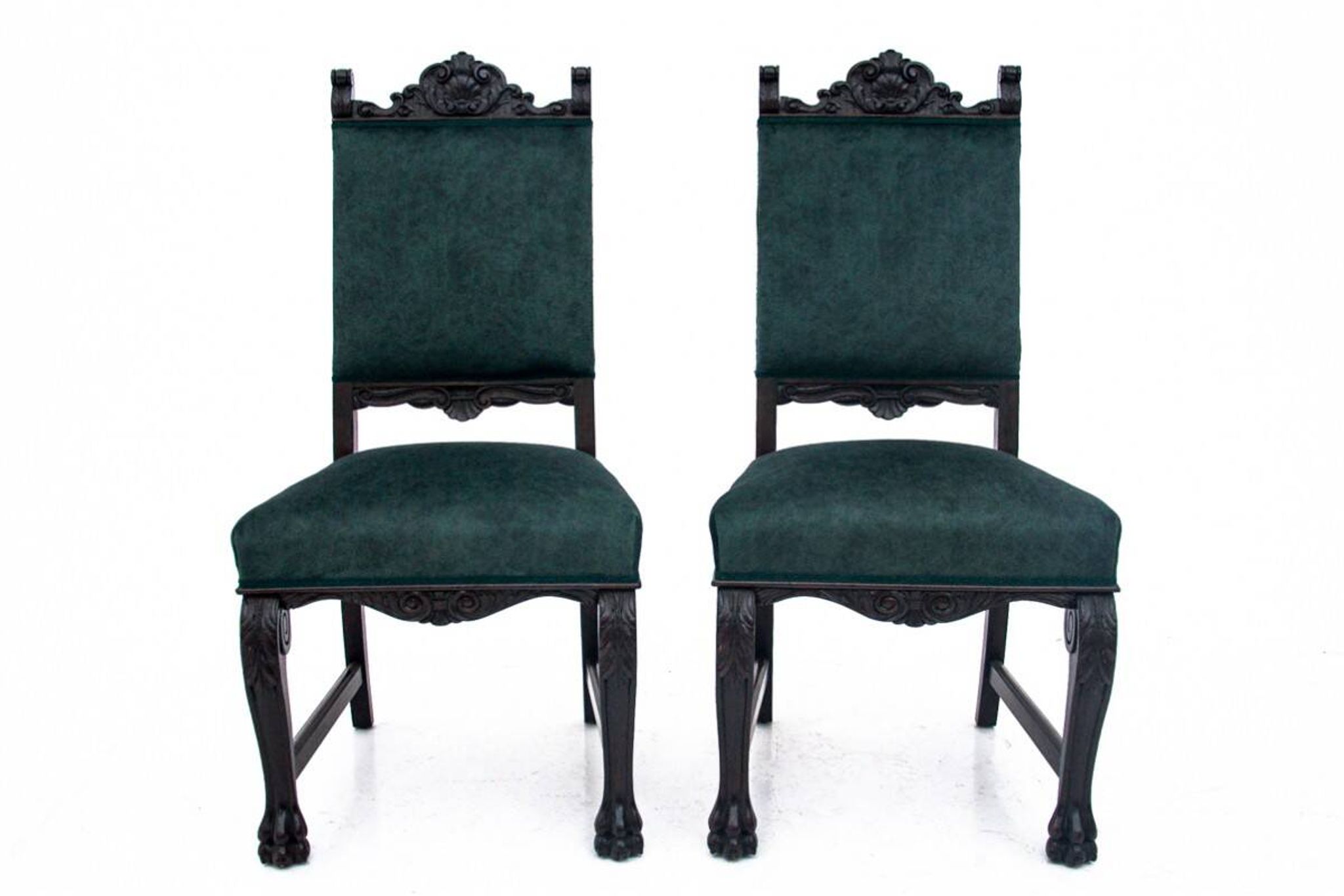 A pair of antique chairs on lion's paws, Western Europe, circa 1920.