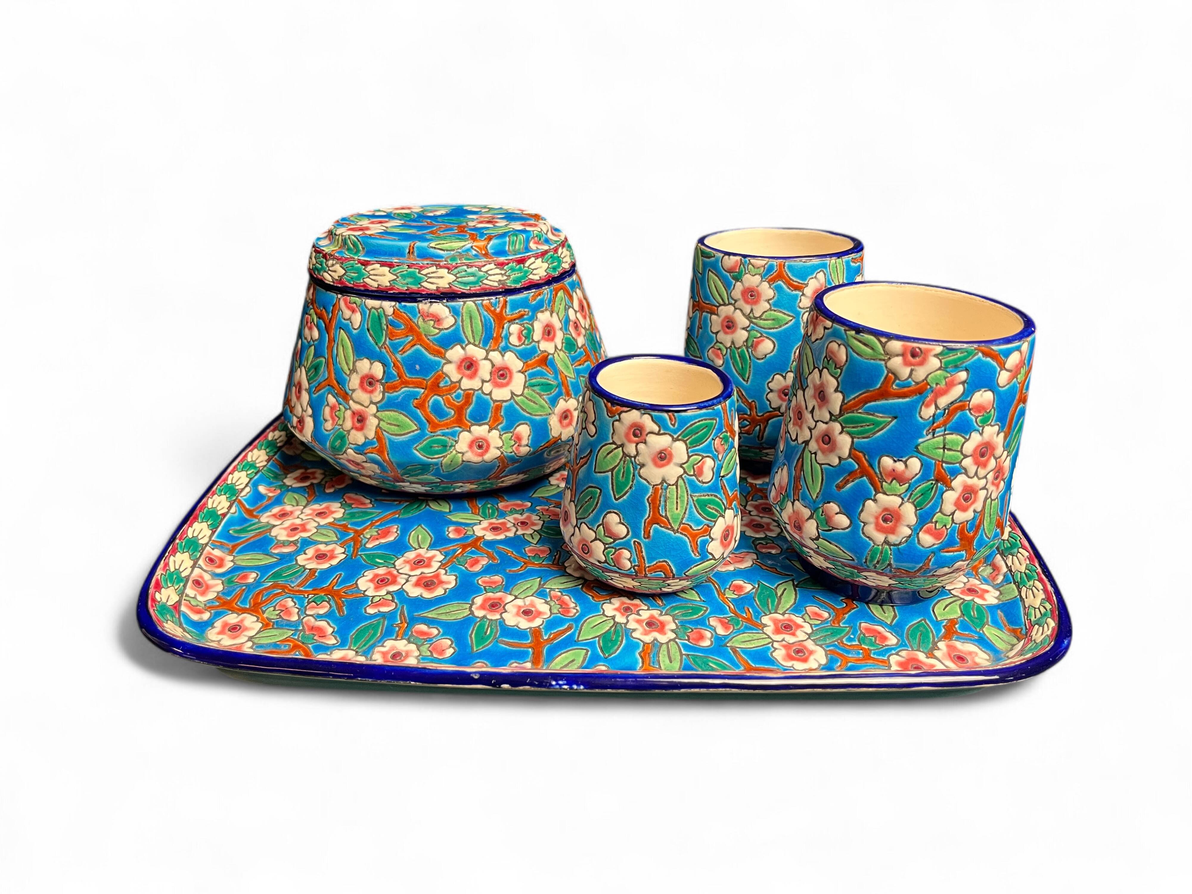 Longwy, cherry blossom glazed earthenware smoking set, early 20th century