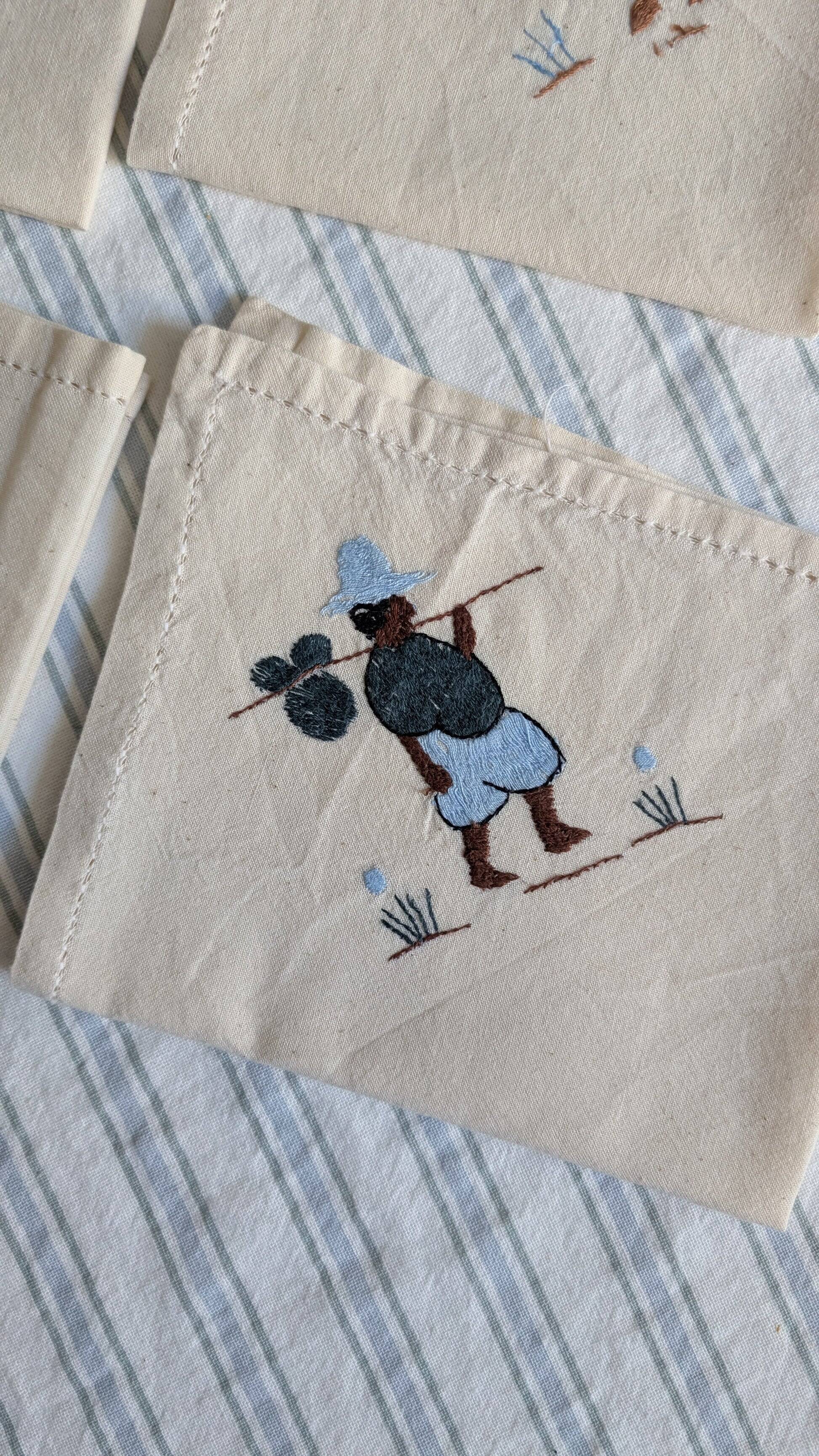 Set of 6 embroidered character napkins