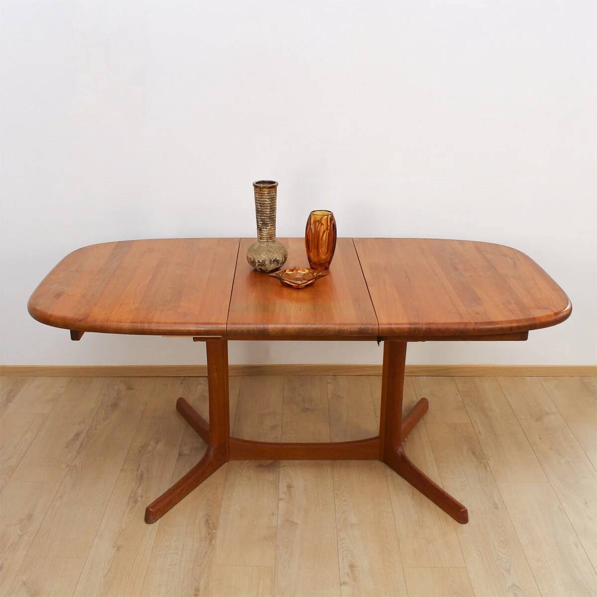 Teak dining table by Dyrlund