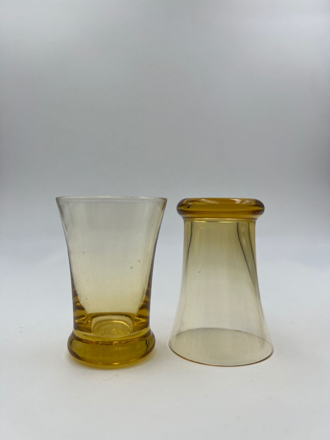 Six yellow glass shooting glasses