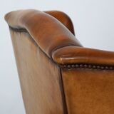 Beautiful and Comfortable Sheepskin Wingback Armchair with a Wonderful Patina